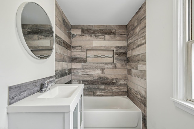 bathroom featuring shower / bath combination and vanity