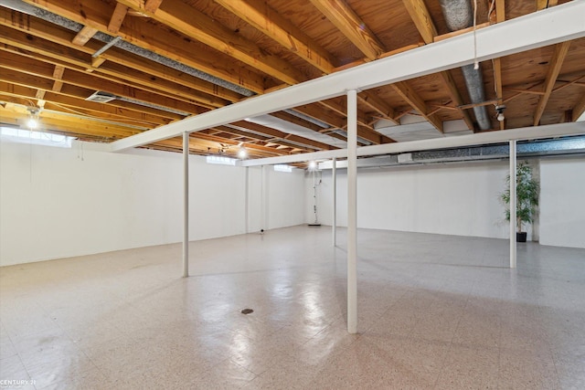 basement with tile patterned floors