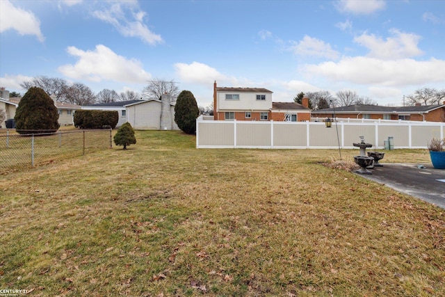 view of yard featuring a fenced backyard