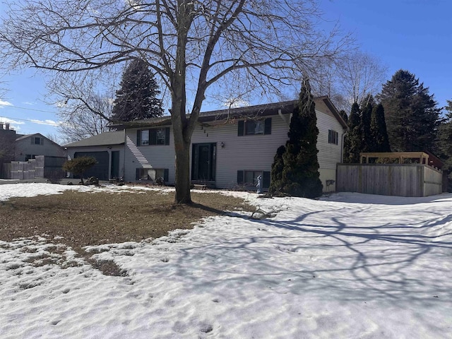 raised ranch with fence