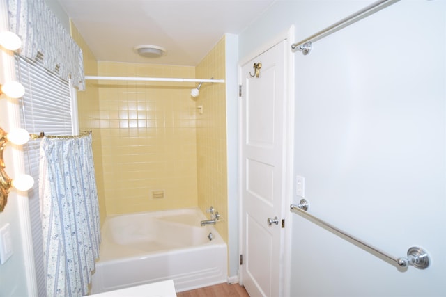 full bath featuring shower / bath combination with curtain