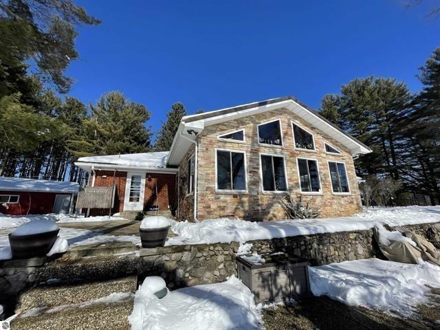 view of front facade featuring stone siding