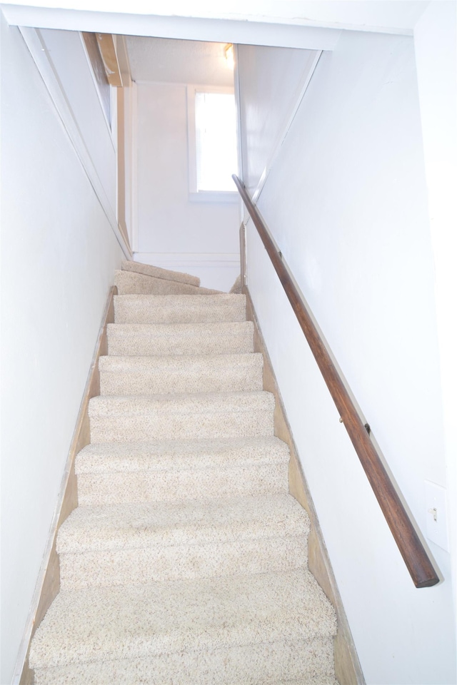 staircase with baseboards