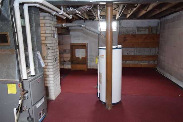 below grade area featuring gas water heater and heating unit