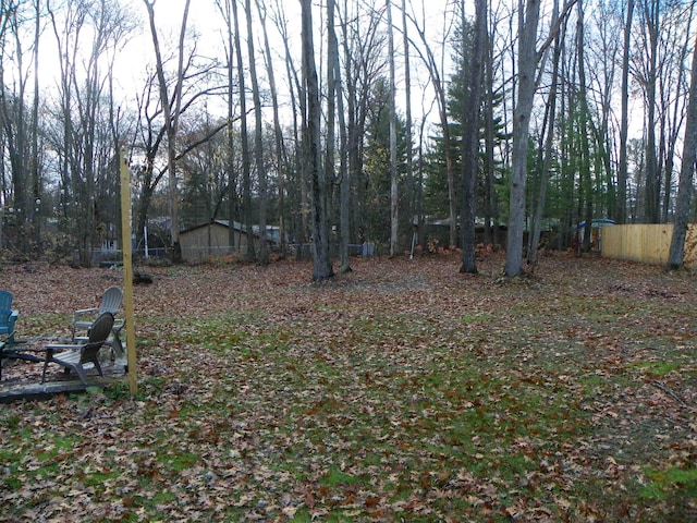 view of yard with fence