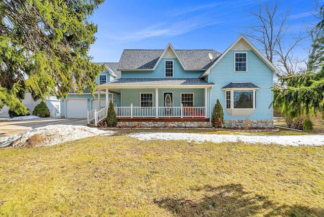 view of front of home with a garage, covered porch, roof with shingles, and a front lawn