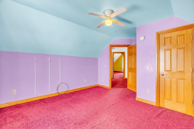 bonus room featuring lofted ceiling, baseboards, ceiling fan, and carpet