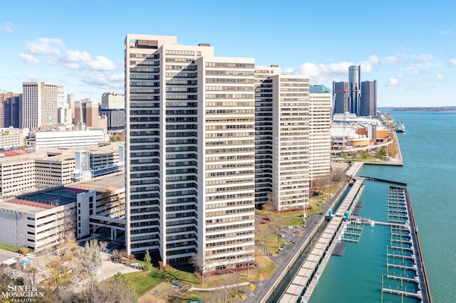 property's view of city featuring a water view