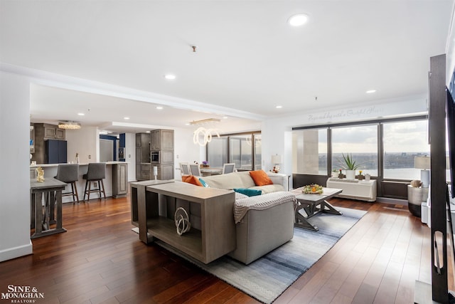 living room featuring dark wood-style floors and recessed lighting