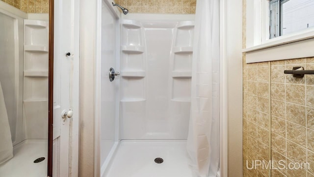 full bathroom with a stall shower