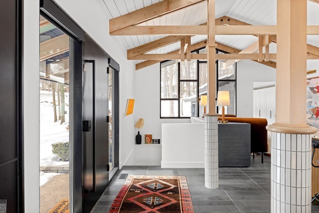 entrance foyer with vaulted ceiling with beams and visible vents