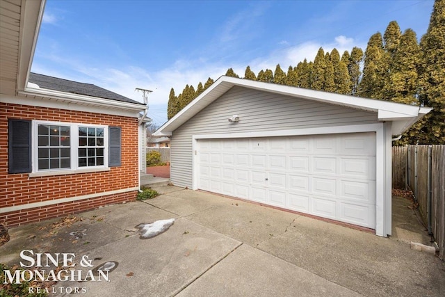 detached garage with fence