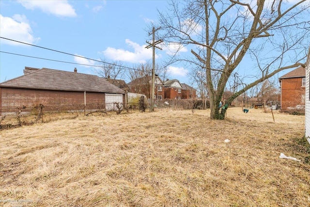 view of yard with fence