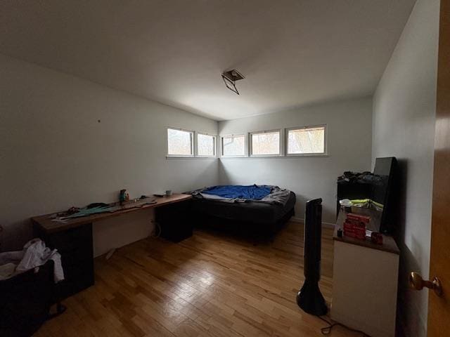 bedroom with light wood-type flooring