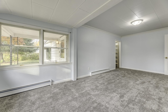 carpeted empty room with a baseboard heating unit, baseboards, ornamental molding, and baseboard heating