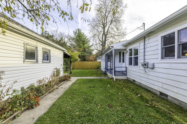 view of yard featuring fence