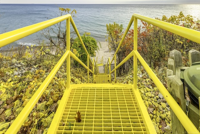 view of jungle gym featuring a water view