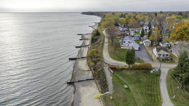 aerial view with a residential view and a water view