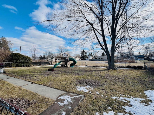 exterior space featuring a yard and fence