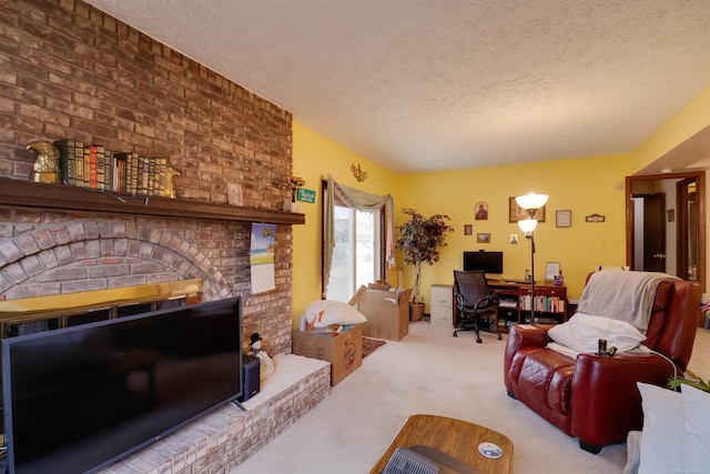 living area with carpet floors, a fireplace, and a textured ceiling