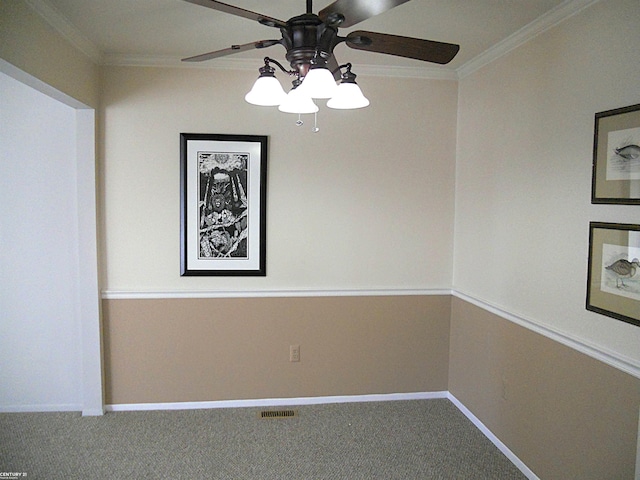 unfurnished dining area featuring ornamental molding, carpet, visible vents, and baseboards