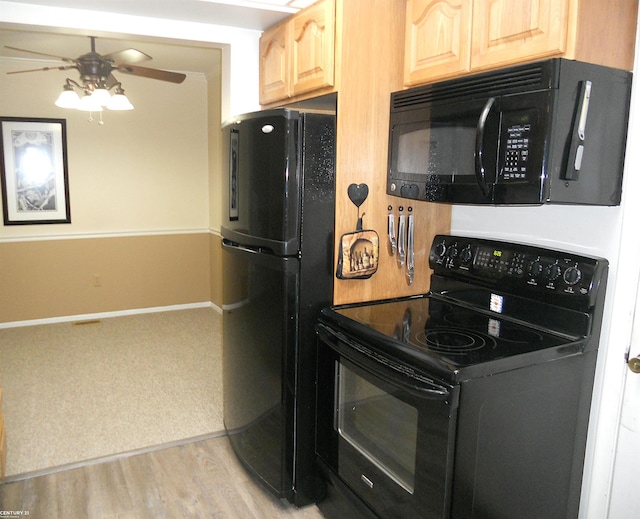 kitchen with ceiling fan, light brown cabinets, light wood-style flooring, baseboards, and black appliances