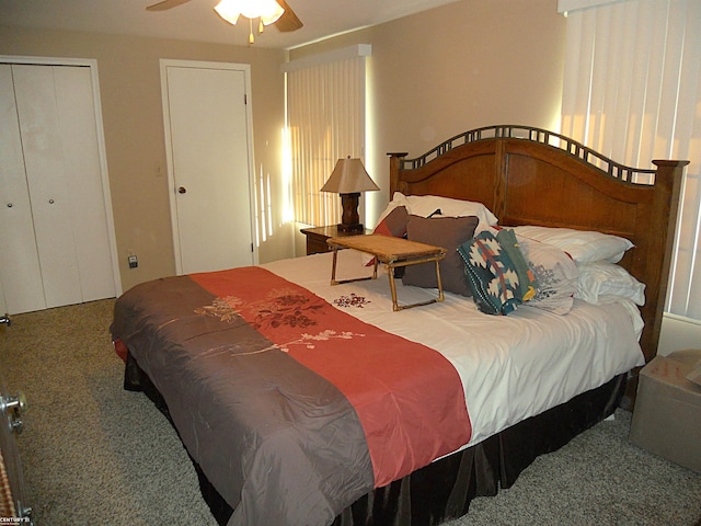 carpeted bedroom with a ceiling fan