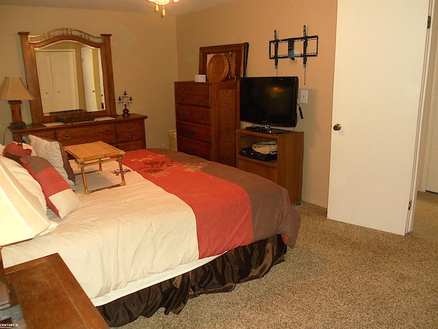 bedroom with light colored carpet