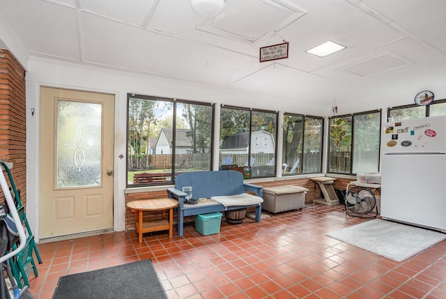 sunroom featuring a wealth of natural light