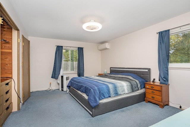 bedroom featuring carpet floors and a wall mounted air conditioner