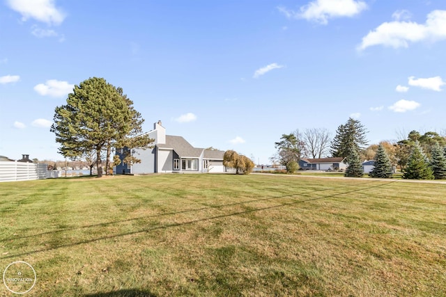 view of yard featuring fence