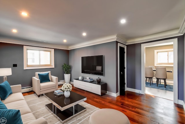 living room featuring recessed lighting, baseboards, baseboard heating, and wood finished floors