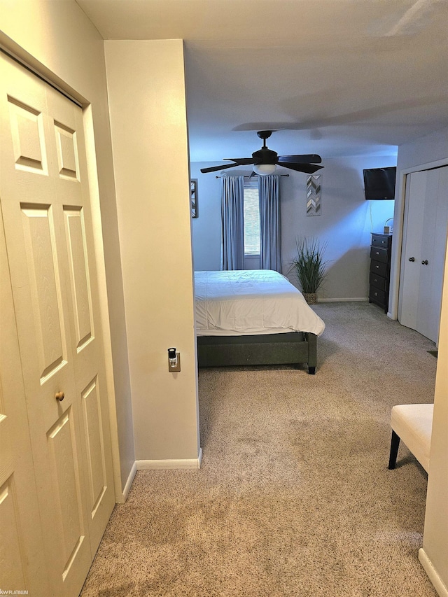 unfurnished bedroom with carpet floors and baseboards