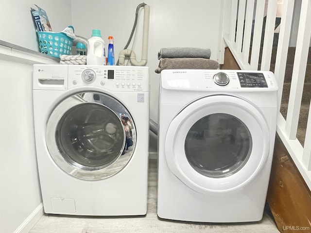 laundry area featuring laundry area and independent washer and dryer