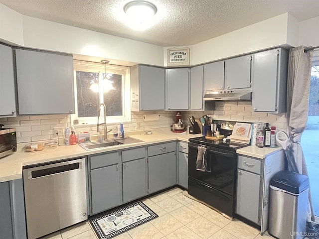 kitchen featuring dishwasher, black range with electric stovetop, gray cabinetry, under cabinet range hood, and a sink