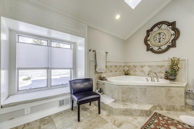 bathroom with ornamental molding, lofted ceiling, a garden tub, and visible vents