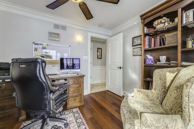 office space with ceiling fan, ornamental molding, dark wood finished floors, and visible vents