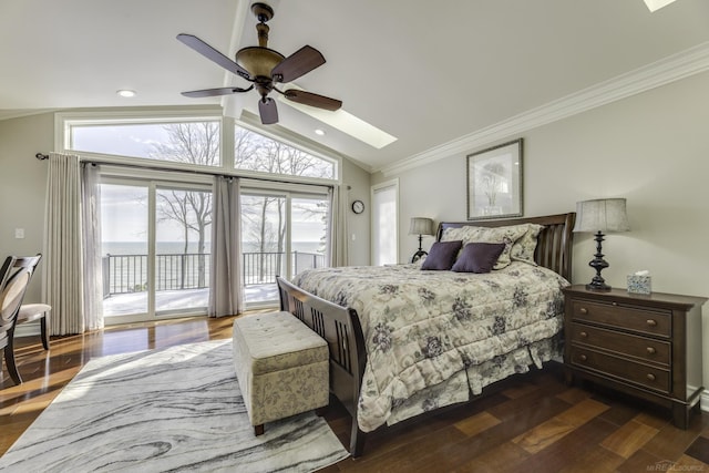 bedroom featuring ceiling fan, access to outside, lofted ceiling with skylight, dark wood finished floors, and crown molding