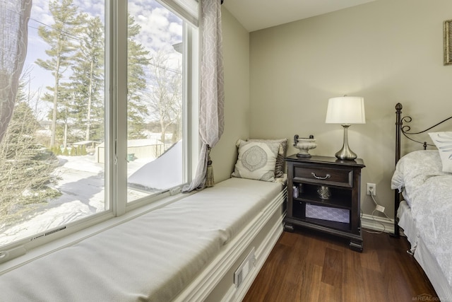 bedroom featuring access to outside and dark wood-style flooring