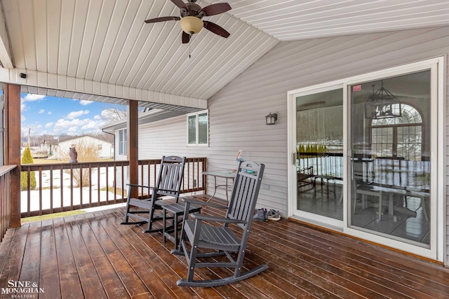 wooden terrace with a ceiling fan