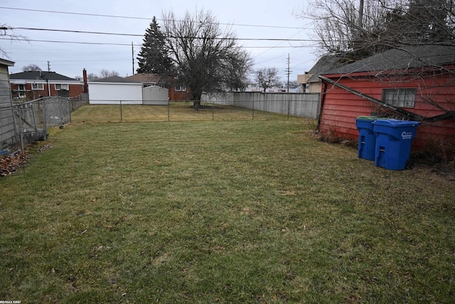 view of yard with a fenced backyard