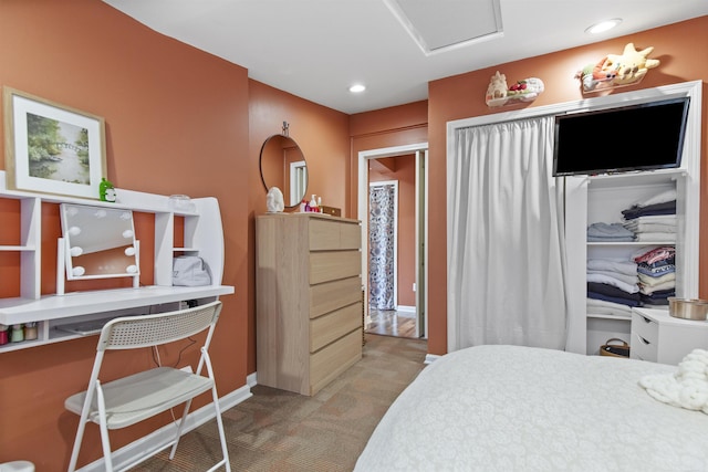 bedroom featuring baseboards and recessed lighting