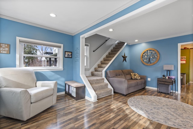 living room featuring recessed lighting, wood finished floors, baseboards, stairs, and crown molding