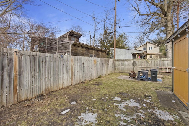 view of yard with a fenced backyard