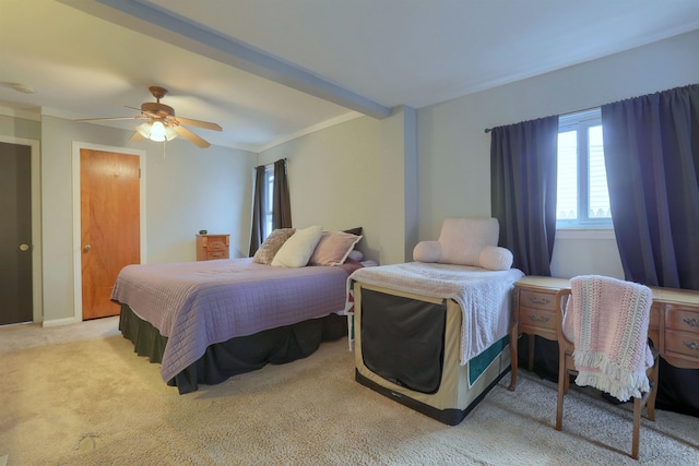 bedroom with ceiling fan, ornamental molding, and light colored carpet