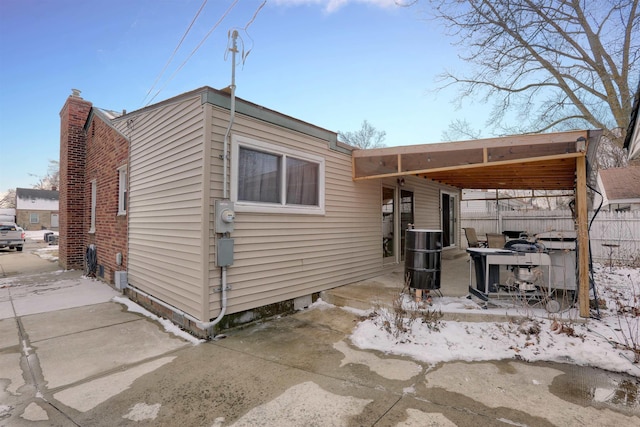 exterior space with a patio area and fence