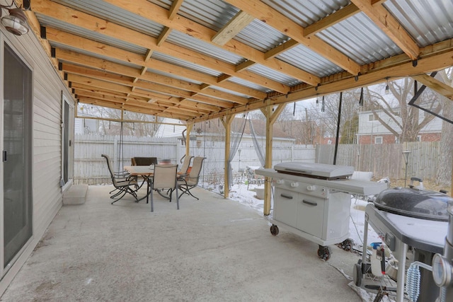 view of patio / terrace featuring outdoor dining space, area for grilling, and a fenced backyard