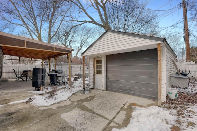 detached garage with fence