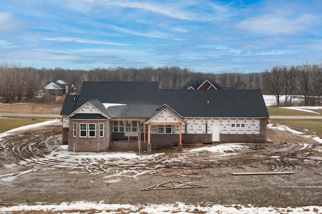 view of snow covered house