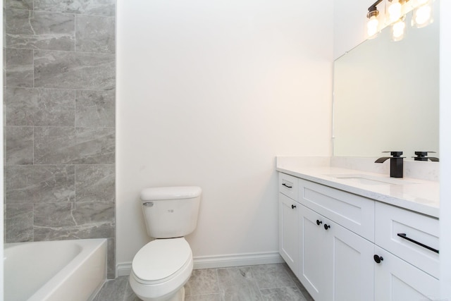 full bath featuring baseboards, vanity, and toilet